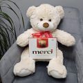 Мягкий медведь и конфеты мерси
